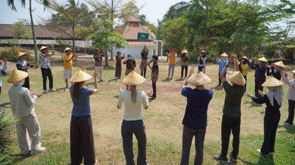 Participants play a mini-game together at Lerep Tourism Village.jpg