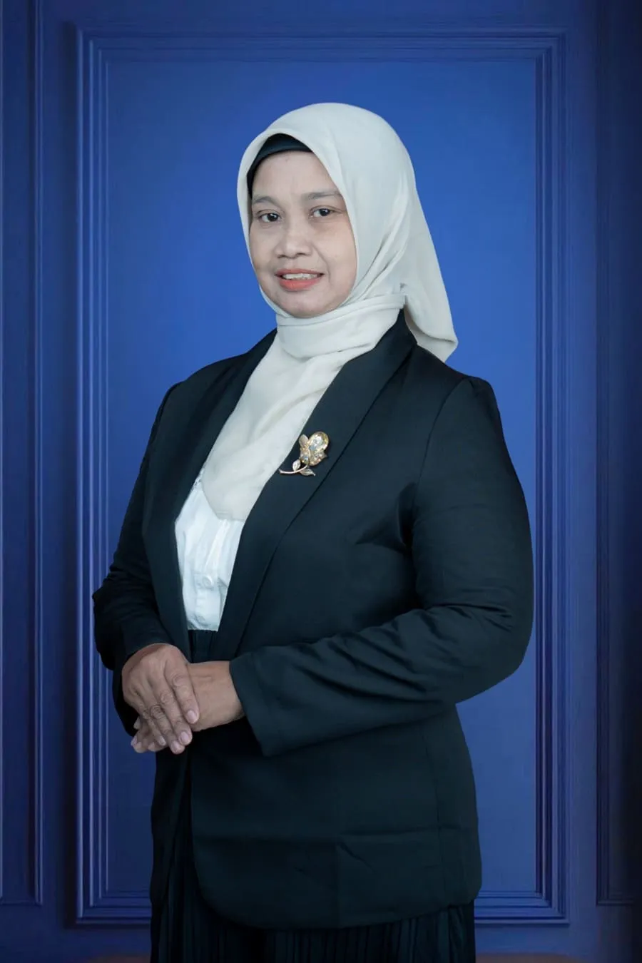 Potret Dewi Elliana, SKM, S.Tr.Keb, M.Kes
