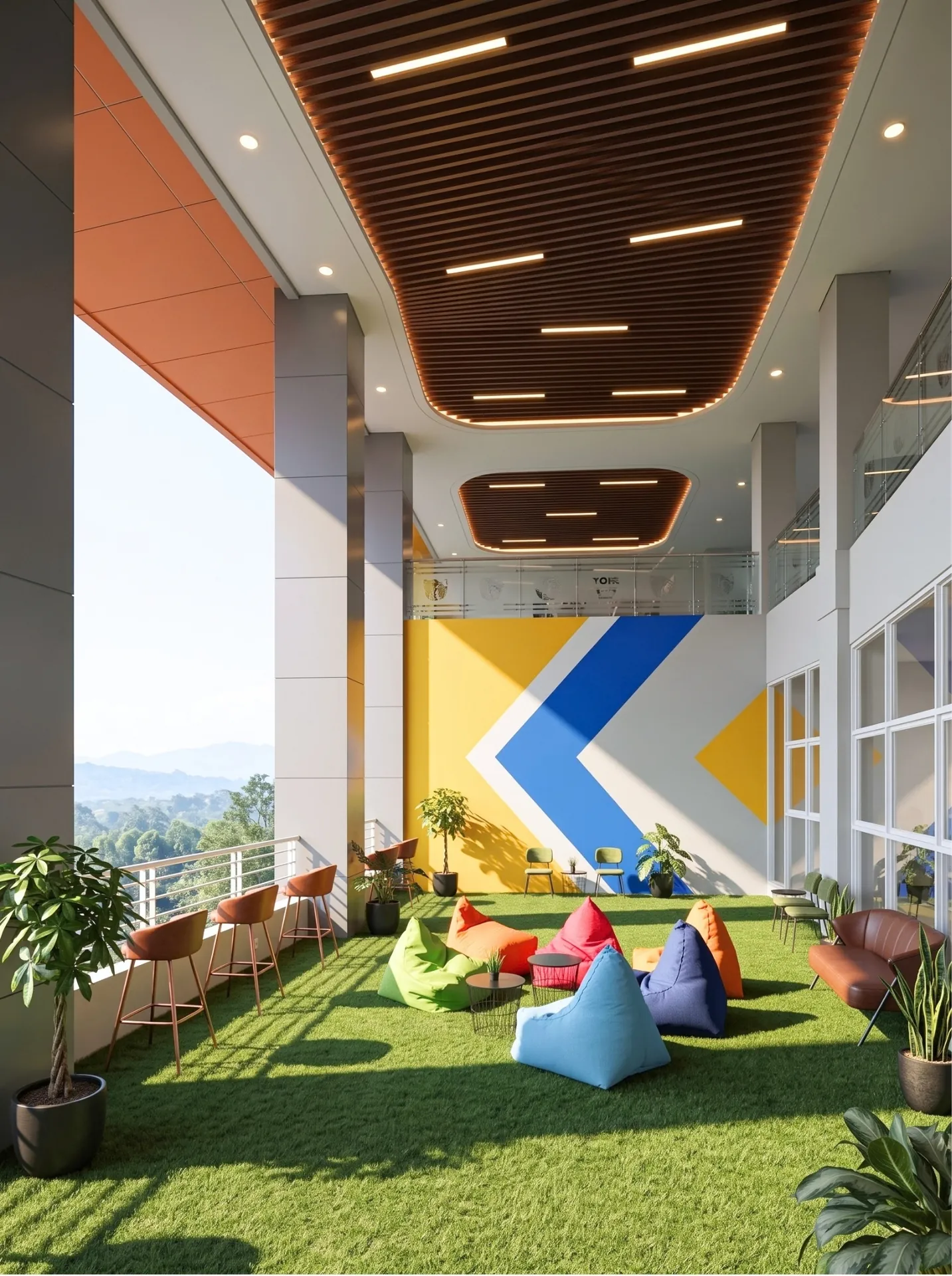 Student lounge APU dengan tempat duduk berwarna, tanaman, dan pemandangan luar
